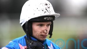 Sutton sits tight to steer Santos Blue to victory