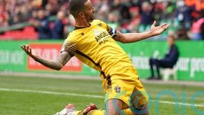 Sutton slip seven points from safety after draw with Walsall