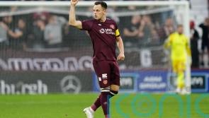 Lawrence Shankland scores from the spot as Hearts hit back to draw with Hibs