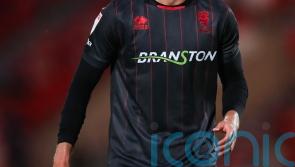 Woking escape relegation zone with victory over in-form Kidderminster