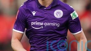 James Belshaw denies Dean Campbell from 12 yards as Harrogate hold Barrow