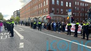 Protesters in standoff near migrant camp in Dublin