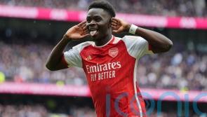 Arsenal withstand Tottenham&rsquo;s second-half fightback to boost title hopes