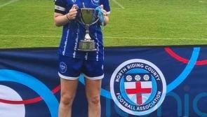 Committee members step down amid row over axing of female football teams