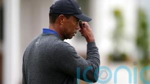 Tiger Woods cuts frustrated figure after 79 leaves him fighting to make Open cut