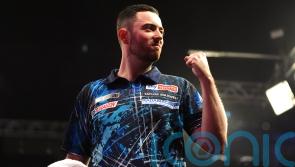 Luke Humphries battles past Dimitri Van den Bergh to reach Blackpool semis