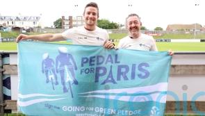 Olympic champion visits football club during climate action bike ride to Paris