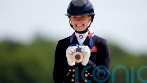 Charlotte Fry celebrates adding individual bronze to team triumph