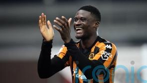 Bachir Belloumi scores twice as Hull rout managerless Cardiff