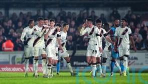 Lincoln ease past non-league Chesham to reach FA Cup second round