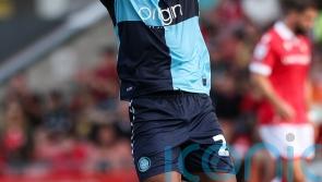 Wycombe hammer Stockport to storm to top of League One