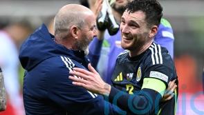 Andy Robertson marks 80th Scotland cap with stoppage-time winner in Poland