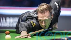 Judd Trump sees off John Higgins in UK Championship last-frame decider