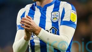 Ollie Turton&rsquo;s strike enough for Huddersfield to see off Wigan