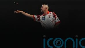 Damon Heta lands nine-darter as World Championship resumes