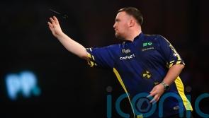 Luke Littler overcomes slow start to progress at World Darts Championship
