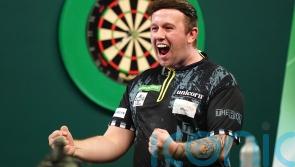 Callan Rydz keeps up perfect record to reach World Championship last 16