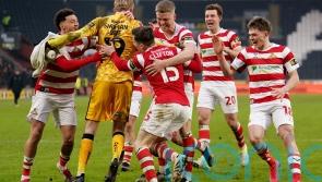 Doncaster shock Hull with penalty shootout victory to reach FA Cup round four