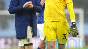 Debutant keeper Alex Palmer inspires 10-man Ipswich to valuable draw at Villa