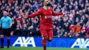 Liverpool survive late scare against Wolves to move seven points clear