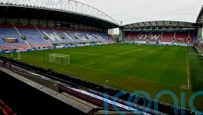 Luke Robinson gives managerless Wigan victory over Cambridge