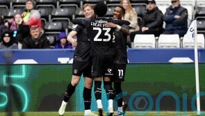 Burnley climb into Championship automatic promotion places with win at Swansea
