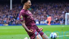 Manchester City score late goals at Everton to boost Champions League chances