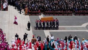 Quiet reverence and a ripple of applause for &lsquo;the people&rsquo;s pope&rsquo;