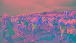 Almost 200 Marilyn Monroe lookalikes take the plunge for charity swim