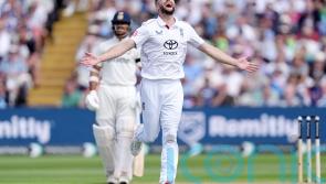 Chris Woakes strikes early for England but India reach lunch on 98 for two