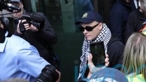 Kneecap rapper faces month-long wait over whether terror charge is thrown out