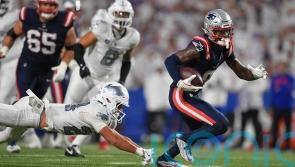 New England Patriots end final unbeaten record with victory at Buffalo Bills