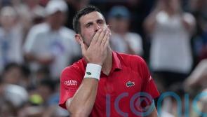Novak Djokovic collapses in Shanghai heat but battles back to reach last eight