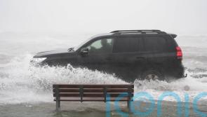 Schools shut and thousands without power as Storm Chandra hits island of Ireland