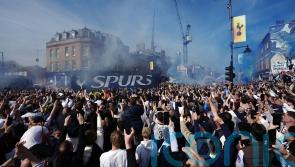Tottenham fans flood streets to welcome team bus ahead of crunch Forest clash