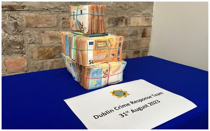 Man and woman arrested on suspicion of money laundering after large sum of cash is seized