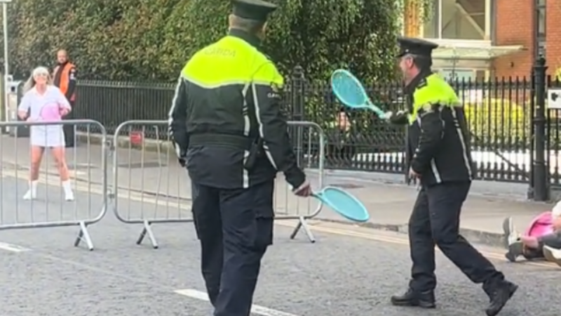WATCH: 'Best craic' - Garda&iacute; play tennis with Swifties on closed road amid Wimbledon fever