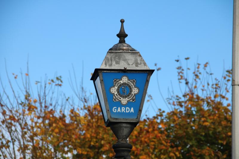 Woman charged following death of man found with serious injuries on road in Dublin town