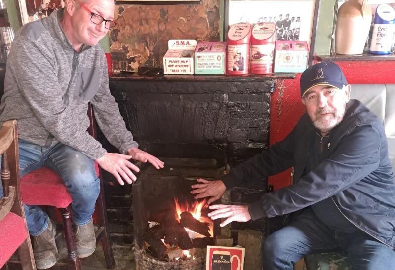 'Carbon footprint up the hole' - Irish pub has savage response to turf fire critic