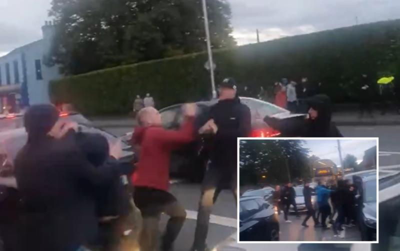 Teen arrested as massive brawl between football fans spills on to major Dublin road