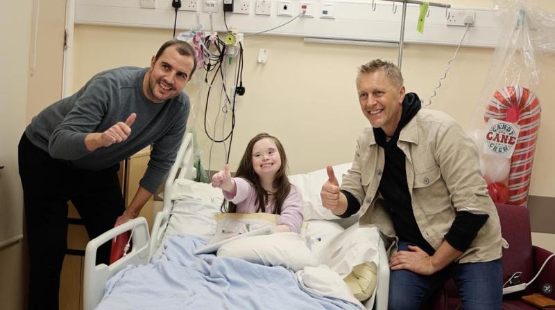 Hallgr&iacute;msson and John O'Shea spread Christmas cheer at children's unit in Crumlin Hospital
