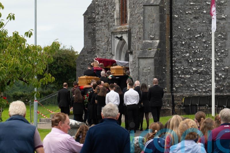 Mourners told mother and children killed in Fermanagh are 'together and finally safe'
