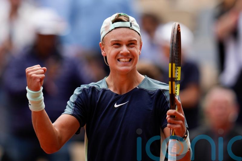 Holger Rune dumps out Stefanos Tsitsipas as young guns shine at Roland Garros