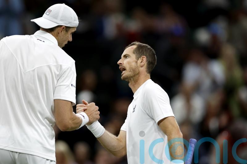 Andy Murray knocked out of Wimbledon by big-serving John Isner