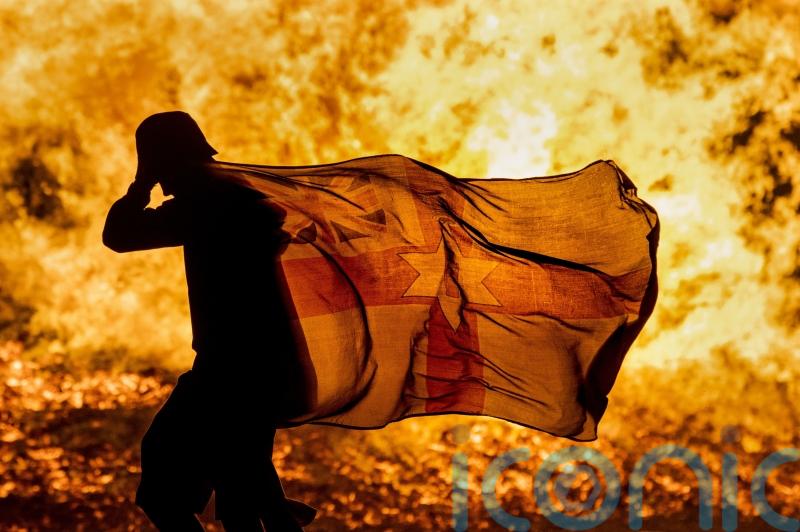 Northern Irish police probe almost 60 potential offences at loyalist bonfires