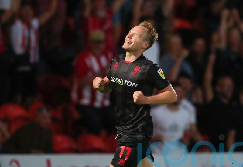 Anthony Scully shines as Lincoln win at Oxford