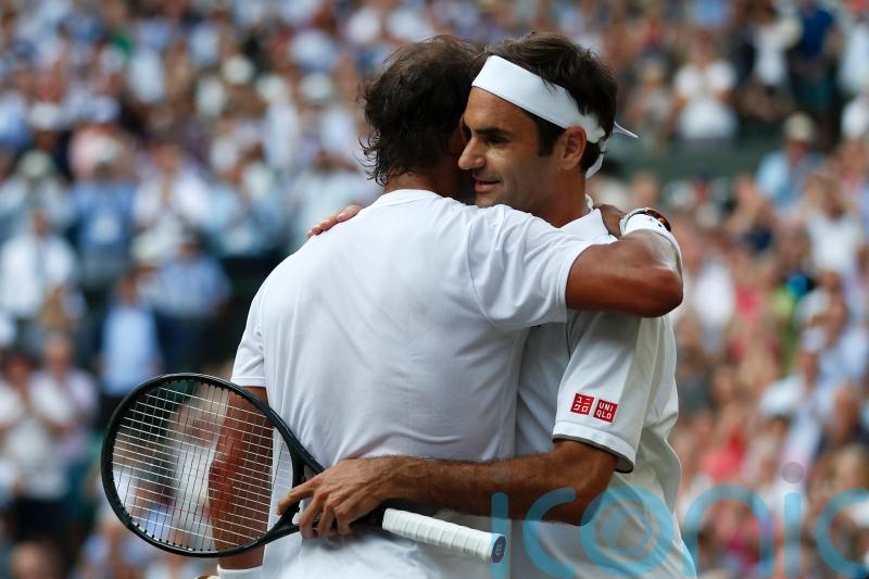 Roger and out: Rafael Nadal leads the tributes to a sporting great