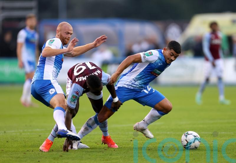 Josh Gordon double sinks Newport to send Barrow into second spot