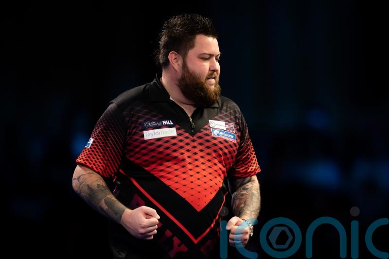 Michael Smith beats Peter Wright at World Series of Darts Finals