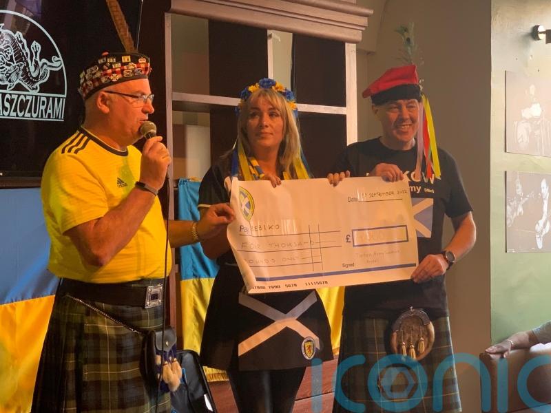 Scotland fans make &pound;4,000 donation to Ukrainian children&rsquo;s charity